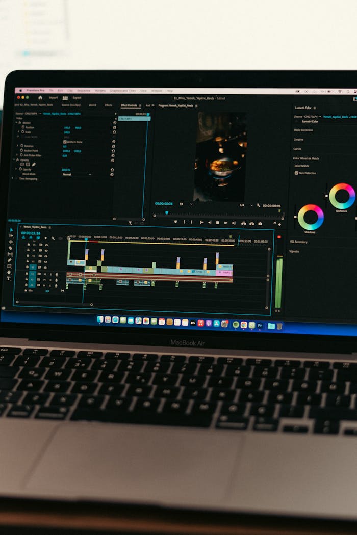 MacBook Air displaying video editing software interface, ideal for technology and digital content themes.